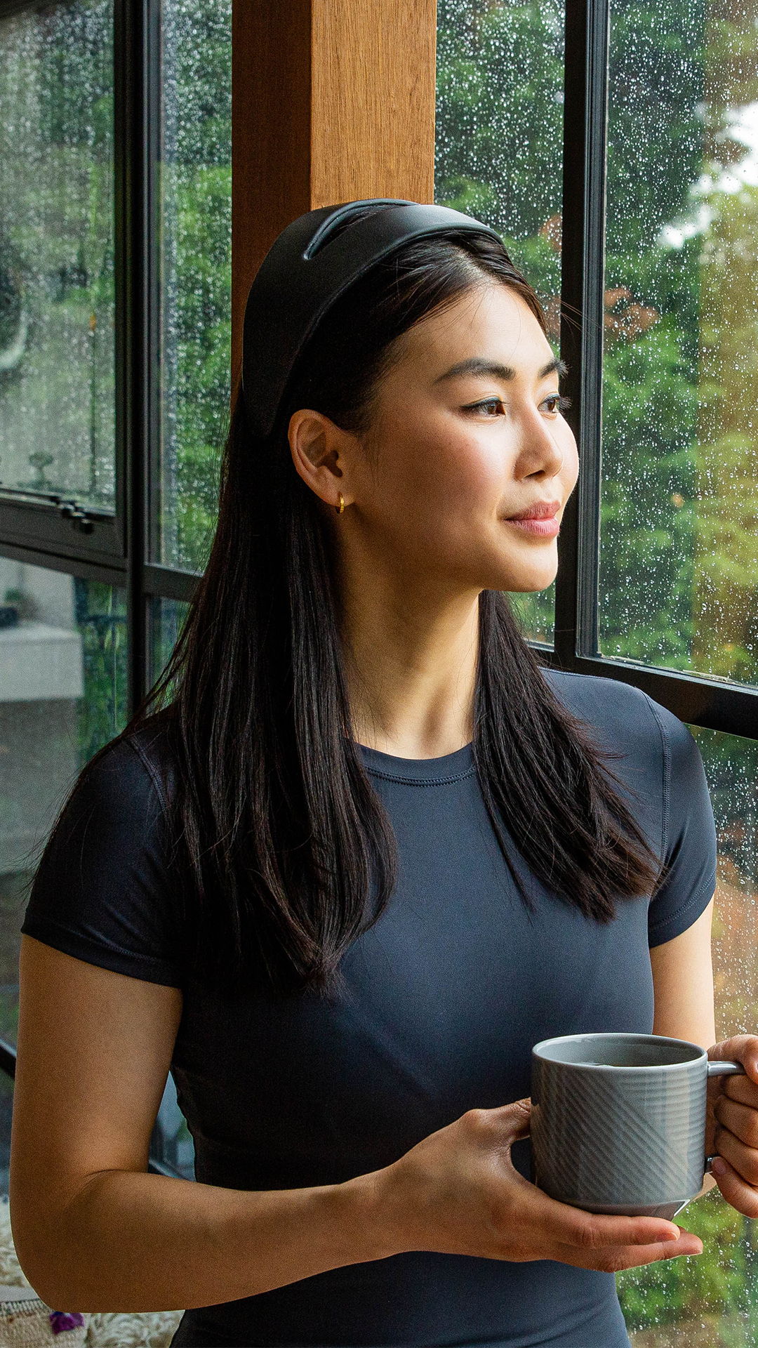 Woman wearing Samphire Neuroscience Headband to prevent PMS with Neuromodulation Therapy at home