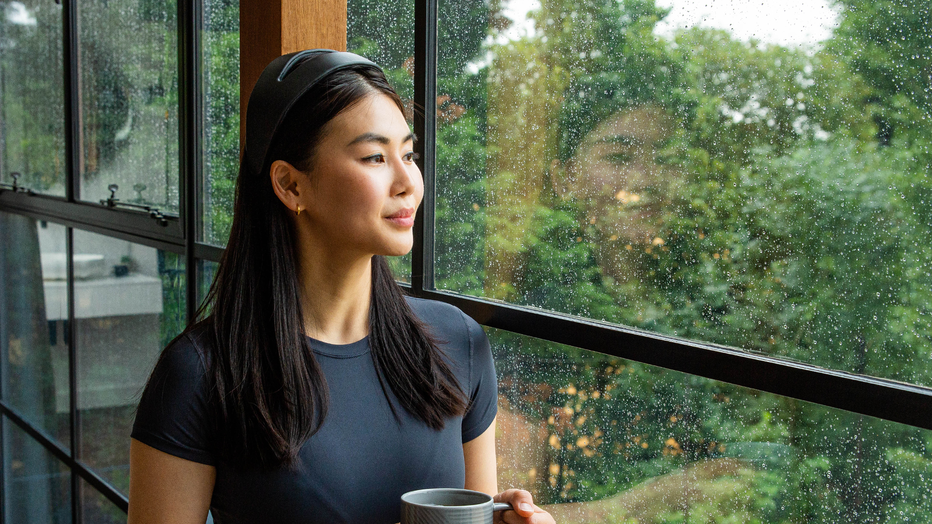 Woman wearing Samphire Neuroscience Headband to prevent PMS with Neuromodulation Therapy at home