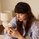 Woman using Samphire device drinking coffee